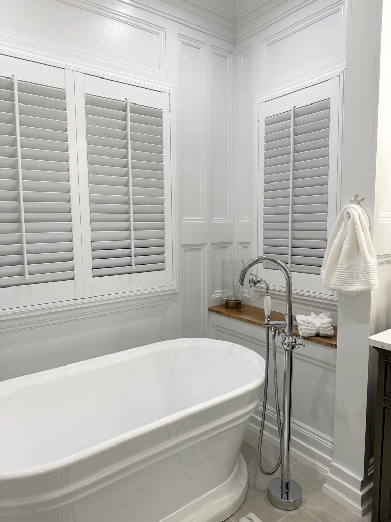 clean beautifull bath area with bathtub