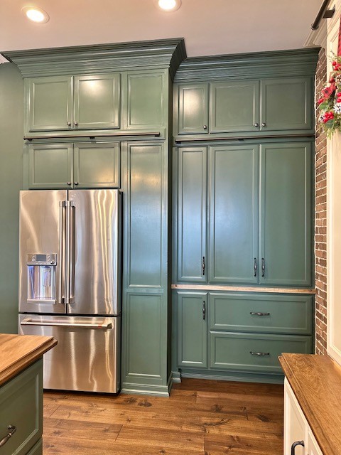 Green kitchen cabinets and appliances