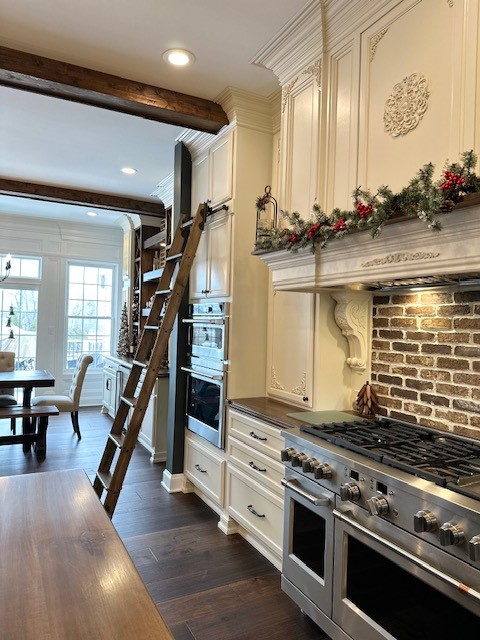 Modern kitchen with wooden ladder
