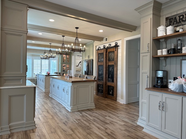 elegant kitchen with green cabinet have beautiful lights