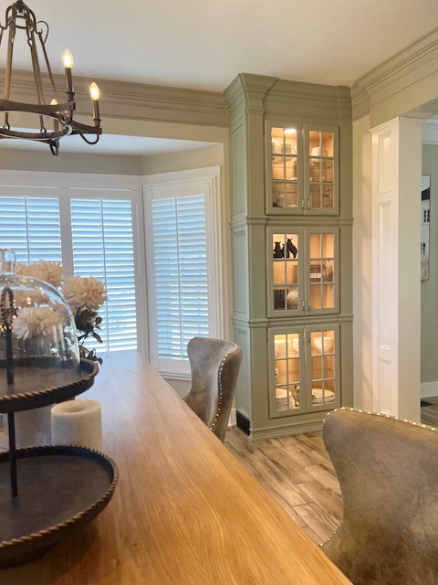 elegant kitchen with green cabinet have beautiful lights