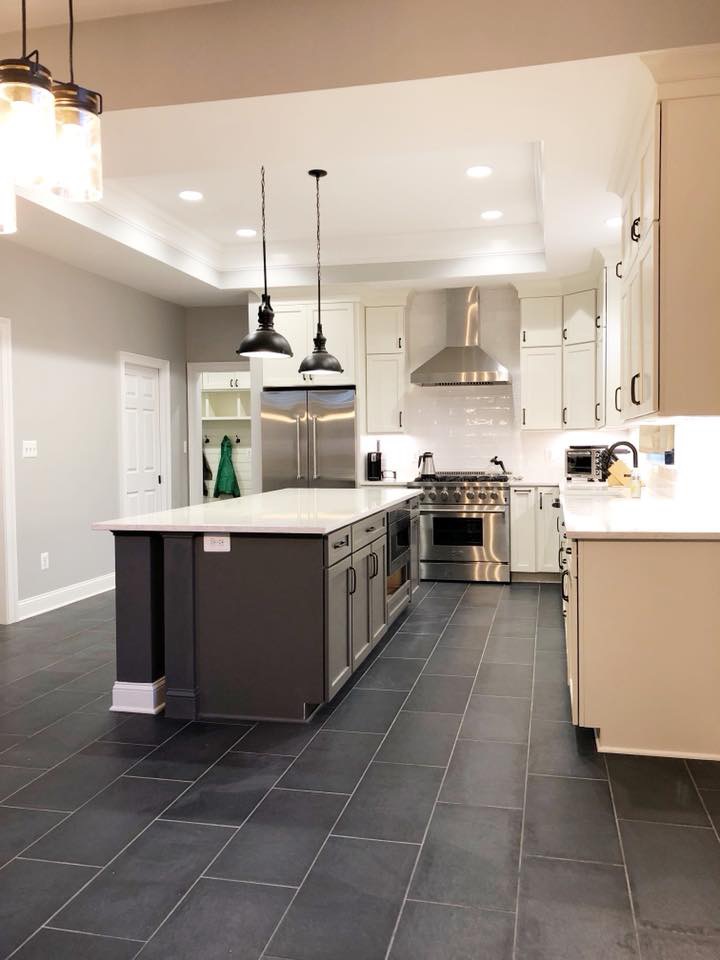 kitchen have beautiful dark gray color cabinets and decoration