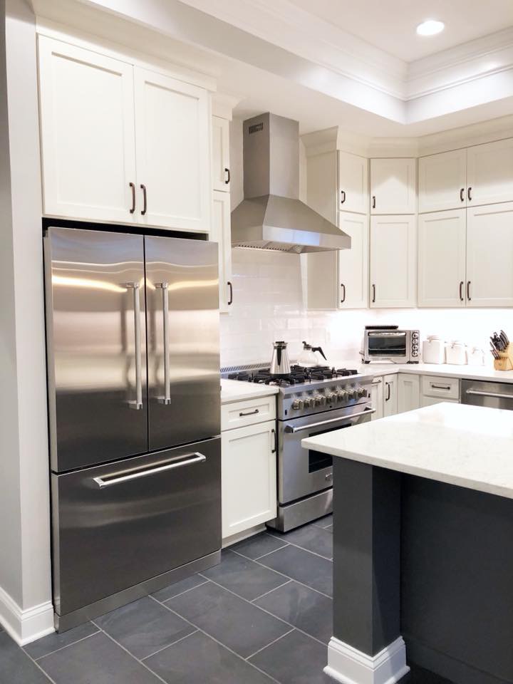 kitchen have beautiful dark gray color cabinets and decoration
