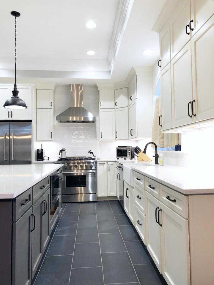kitchen have beautiful dark gray color cabinets and decoration