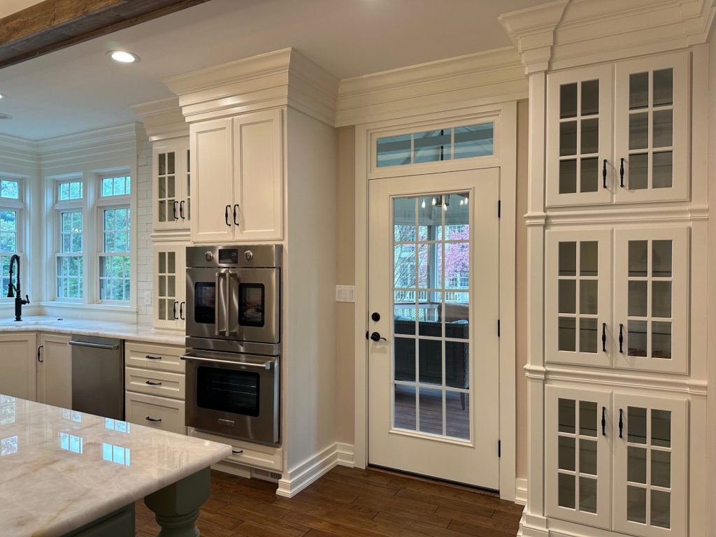 Modern kitchen with white cabinets